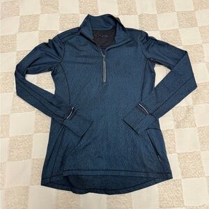 Lululemon Outrun 1/2 Zip pullover jacket in a teal spray jacquard pattern
